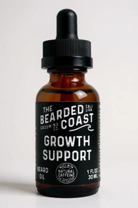 Bearded Coast Growth Support Beard Oil bottle with dropper, labeled with natural caffeine and 1 fl oz size