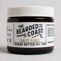Bearded Coast Salty Vibes Beard Butter in amber jar with white lid and bold label, 2 oz / 59 ml size