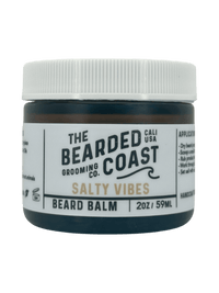 2oz jar of “Salty Vibes” beard balm by The Bearded Coast with white lid and bold branding.