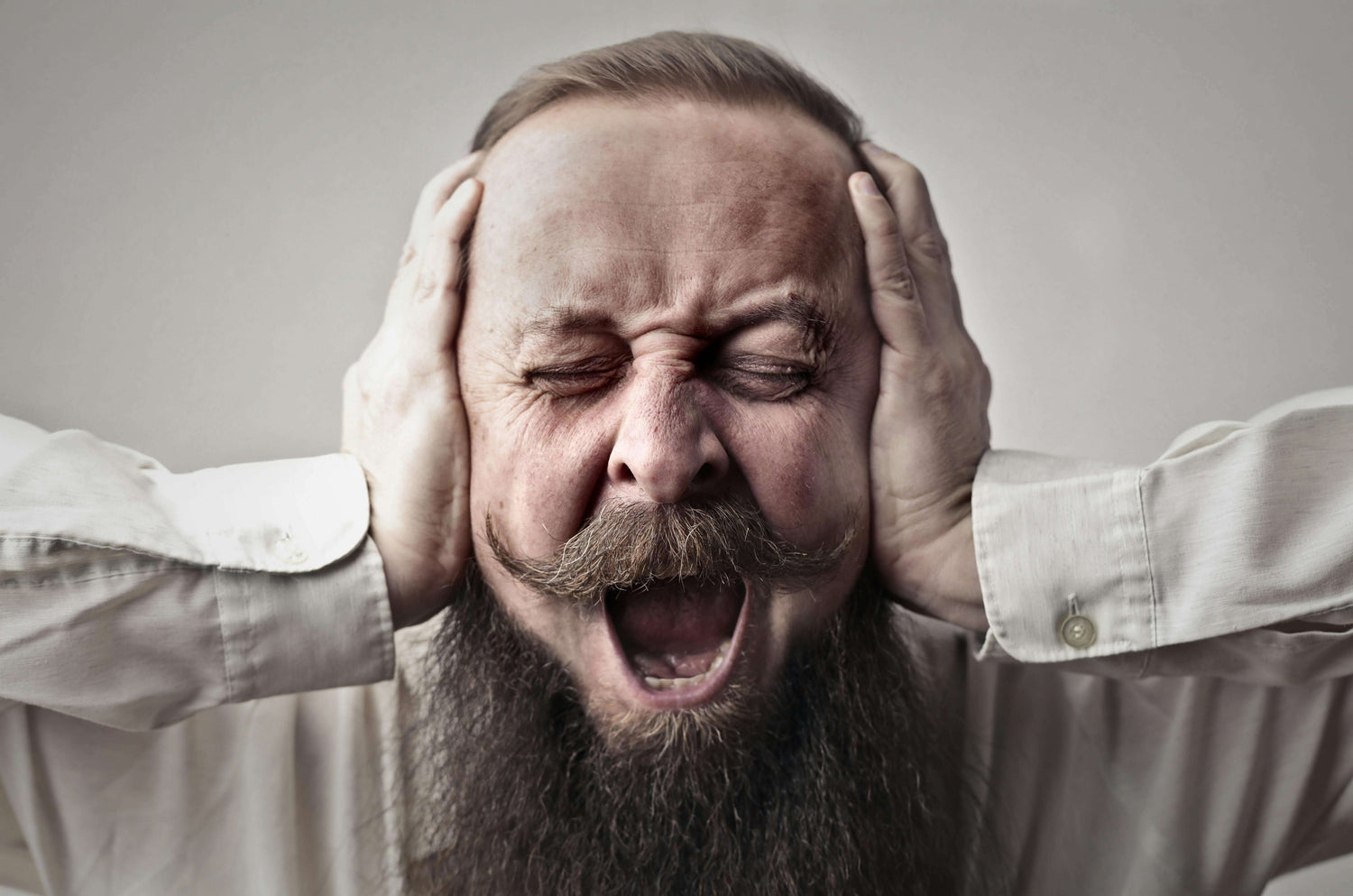bearded man yelling
