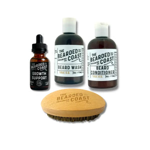 Beard Growth Support Kit with oil, wash, conditioner, and wooden brush on white background