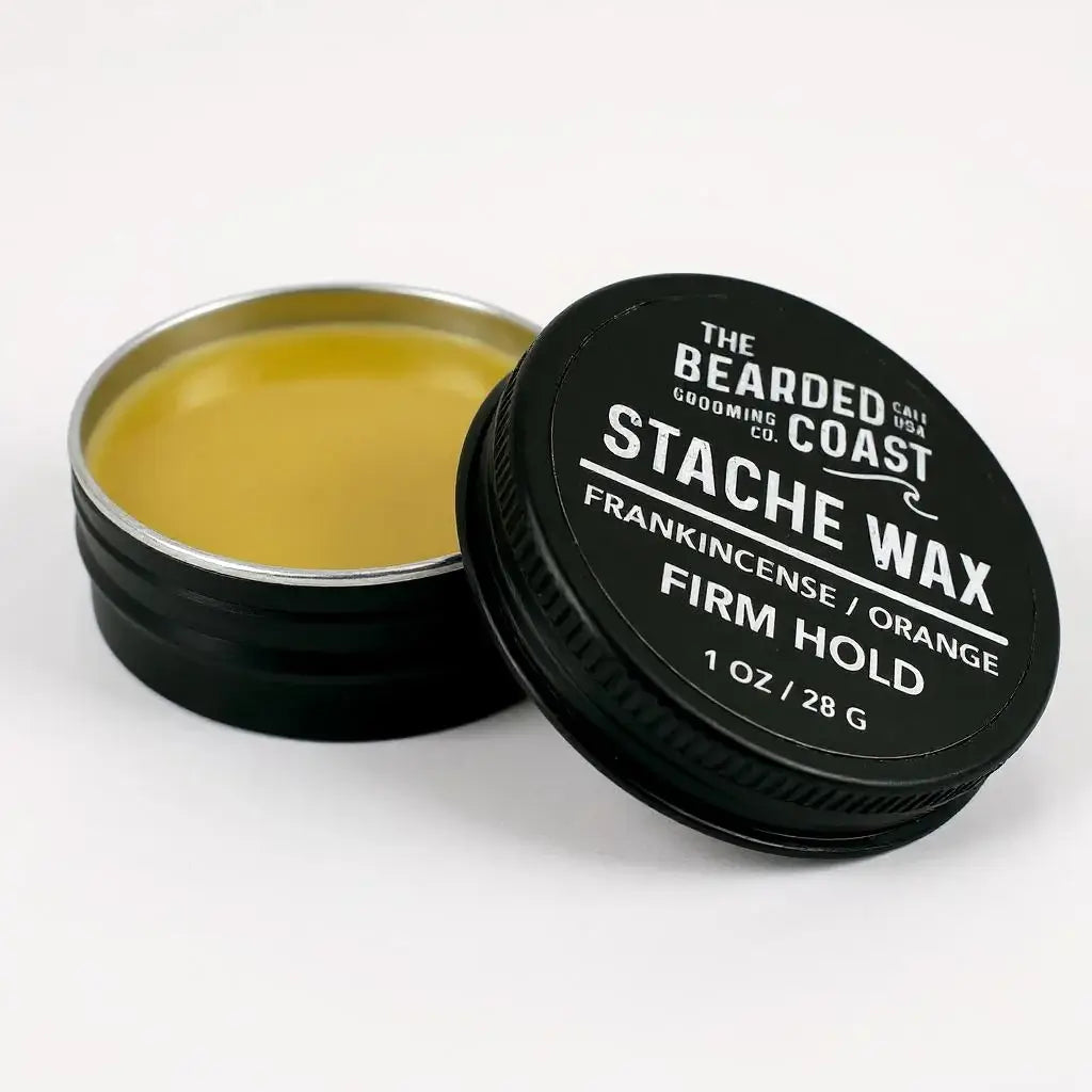Open tin of Bearded Coast Stache Wax with frankincense and orange scent, labeled for firm hold styling
