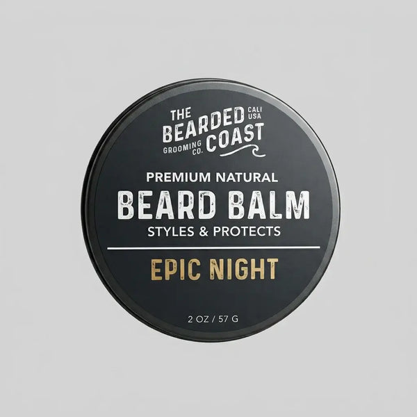 Top-down view of The Bearded Coast Grooming Co. Epic Night Premium Natural Beard Balm — a 2 oz / 57g dark charcoal metal tin with gold and white typography on a gray background